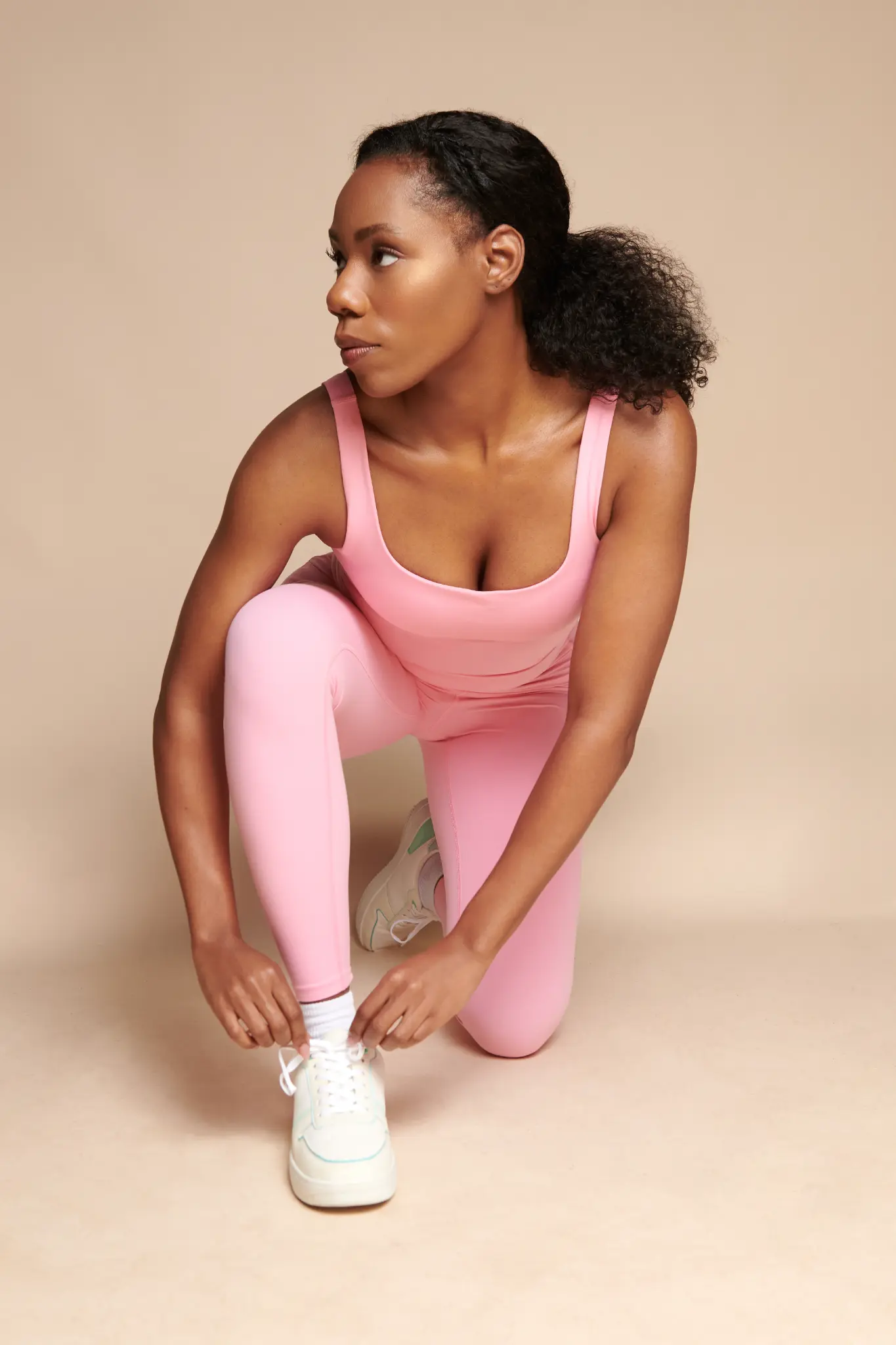 Alesha in pink athletic wear